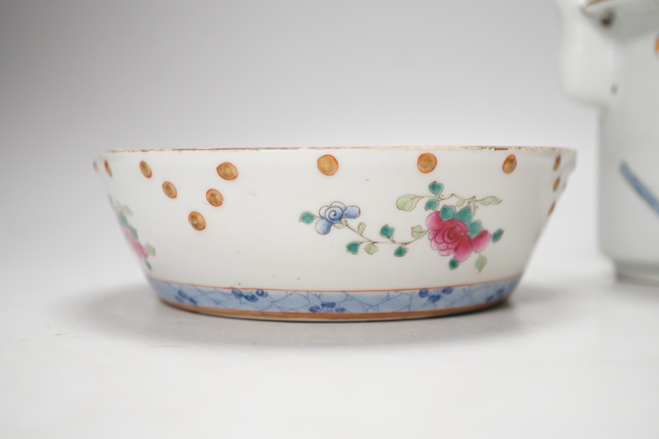 A Chinese famille rose teapot and a cover, together with a similar dish. 12cm tall
